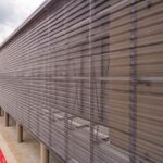 Essential Tools for Seamless Corrugated Panel Installation ACM Panel Supplier & Contractor bwr360 perforated corrugated facade vc church 0