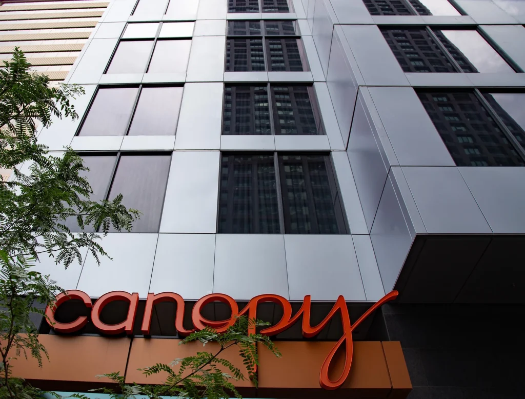 Canopy hotel building with custom-sized aluminum plates for a distinctive, modern look.