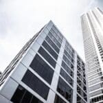 Close-up of non-combustible aluminum plates on high-rise facade, offering both safety and aesthetic appeal.